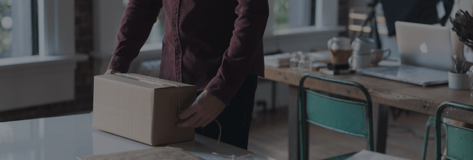 Guy holding a box